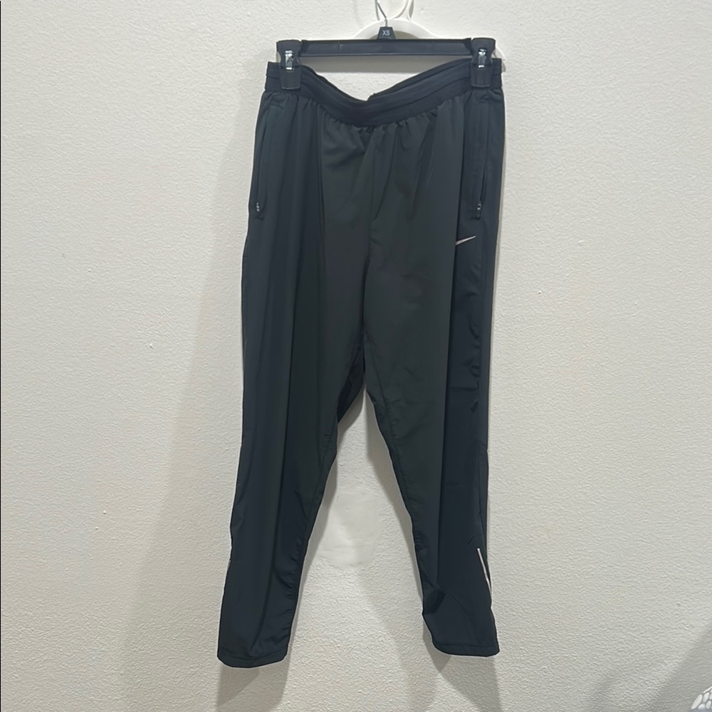 Nike Women’s Black Track Pants with Elastic Waistband and Tapered Legs